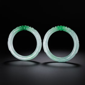 A pair of Chinese dragon-patterned bracelets from the 18th-19th centuries, dating from the Qing