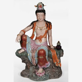 A large, well-preserved 18th-century polychrome seated Guanyin statue from the Qing Dynasty, bearing