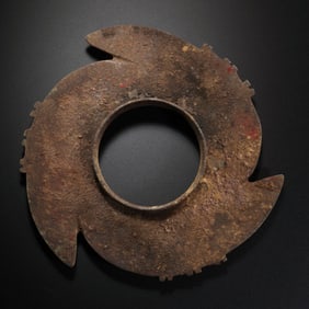 A ring-shaped jade axe from the Liangzhu culture, Neolithic period, dating back 4000-5000 years.