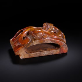 Red agate sword ornament from the Han Dynasty, 1st-2nd century AD.