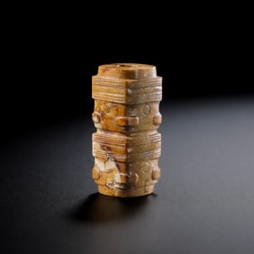 Two sections of yellow jade cong from the Liangzhu culture of the Neolithic period, dating back