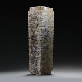 A five-section celadon jade cong with animal mask design from the Liangzhu culture of the Neolithic