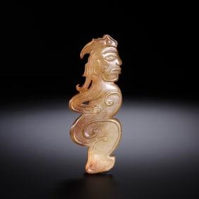 Deity-human figures from the Western Zhou Dynasty, 800-600 BC.