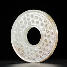 1st-2nd century AD, Chinese Han Dynasty, Hetian white jade bi disc with tadpole pattern