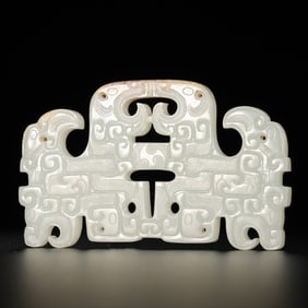 1st-2nd century AD, Chinese Han Dynasty, Hetian white jade bi disc with black bird design