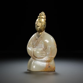 Gold-plated jade dancers from the Han Dynasty, 1st-2nd century AD.