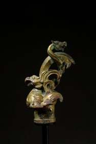 Gilt bronze dragon and phoenix scepter head from the Warring States period, 2nd century BC or later.