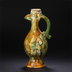 A sancai (three-color glazed) phoenix-head ewer from the Tang Dynasty (7th-8th centuries AD).