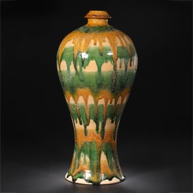 A sancai (three-color glazed) plum vase from the Tang Dynasty (7th-8th centuries AD).