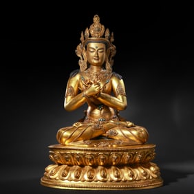 Gilt bronze seated Guanyin statue inlaid with gemstones, Ming Dynasty, China, 14th-15th century AD