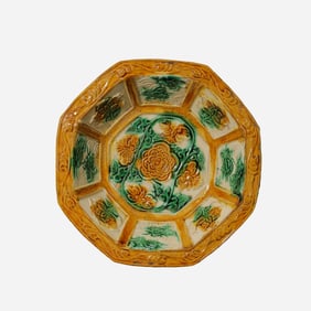 A large tricolor plate from the Liao Dynasty in China, dating back to the 10th century AD.
