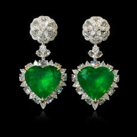 A pair of CGRL 18K gold and diamond earrings set with natural emeralds