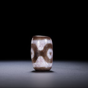 A RARE AND MONUMENTAL 'THREE-EYED' DALO DZI BEADHIMALAYAN REGION, TIBET, ANCIENT TO MEDIEVAL PERIOD