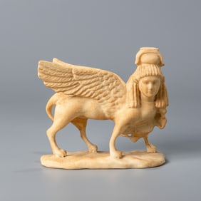 HELLENISTIC GREEK MARBLE SPHINX WITH WINGS