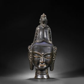 A RARE AND MAGNIFICENT LARGE ALLOY COPPER HEAD OF BUDDHANEPAL OR CENTRAL TIBET, 12TH - 13TH CENTURY
