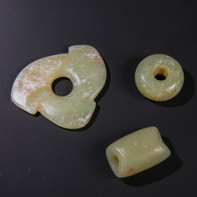 RARE GROUP OF THREE JADE ORNAMENTSHONGSHAN CULTURE, NEOLITHIC PERIOD (C. 3500-3000 BC)