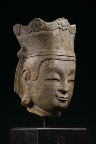 A RARE AND IMPORTANT CARVED LIMESTONE HEAD OF GUANYINNORTHERN QI / SUI DYNASTY (6TH-7TH CENTURY)