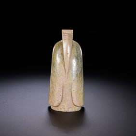 MONUMENTAL AND RARE 'CHICKEN-BONE' WHITE JADE FIGURE OF WENGZHONGHAN DYNASTY (202 BC – 220 AD)