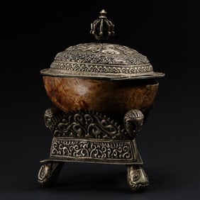 A RARE AND MAGNIFICENT SILVER-MOUNTED KAPALA (SKULL CUP), COVER AND STANDTIBET, LATE 18TH – 19TH