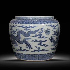 A MASSIVE AND IMPOSING BLUE AND WHITE 'DRAGON' FISH BOWLMING DYNASTY (1368-1644)