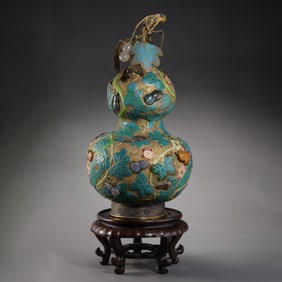 A RARE AND MAGNIFICENT IMPERIAL GILT-BRONZE AND CLOISONNÉ ENAMEL 'MULTI-TREASURE' DOUBLE-GOURD