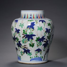 A VIBRANT 'WUCAI' 'SQUIRREL AND GRAPES' JARMING DYNASTY OR EARLY QING DYNASTY (17TH CENTURY)