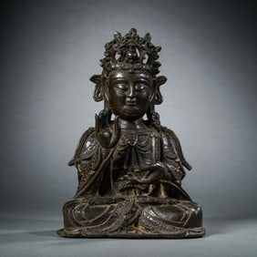 A FINELY CAST BRONZE FIGURE OF A SEATED GUANYINMING DYNASTY (1368-1644)