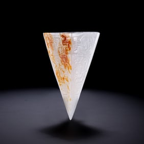 A RARE AND UNUSUAL ARCHAISTIC WHITE JADE TRIANGULAR 'TAOTIE' PENDANTMING DYNASTY OR LATER (14TH –