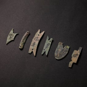 A GROUP OF INSCRIBED BRONZE FRAGMENTS WITH ORACLE BONE SCRIPTLATE SHANG TO EARLY ZHOU DYNASTY (C.