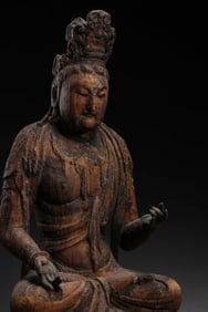 A RARE AND IMPORTANT CARVED WOOD FIGURE OF GUANYINLATE TANG TO SONG DYNASTY (9TH – 12TH CENTURY)