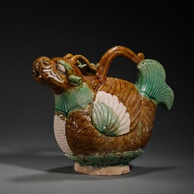 A RARE 'SANCAI'-GLAZED 'FISH-DRAGON' EWERLIAO DYNASTY (907-1125)