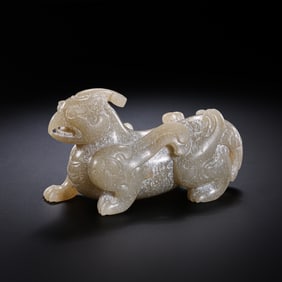 RARE AND DYNAMIC HETIAN WHITE JADE 'PHOENIX-BEAKED' MYTHICAL BEASTWARRING STATES PERIOD (475-221 BC)