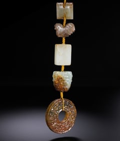 A RARE COMPOSITE SET OF FIVE JADE PENDANTS AND ORNAMENTSHAN DYNASTY STYLE AND POSSIBLY LATER (C. 2ND