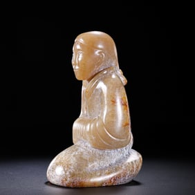 A MAGNIFICENT AND HIGHLY IMPORTANT HETIAN WHITE JADE KNEELING FIGURE,YU GUI RENHAN DYNASTY (206 BC