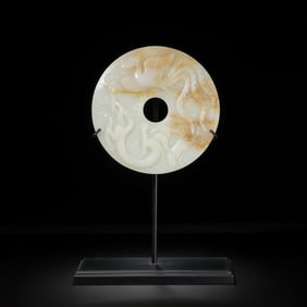 A MAGNIFICENT AND MONUMENTAL WHITE JADE 'DRAGON AND PHOENIX' BI DISKHAN DYNASTY OR LATER (C. 2ND