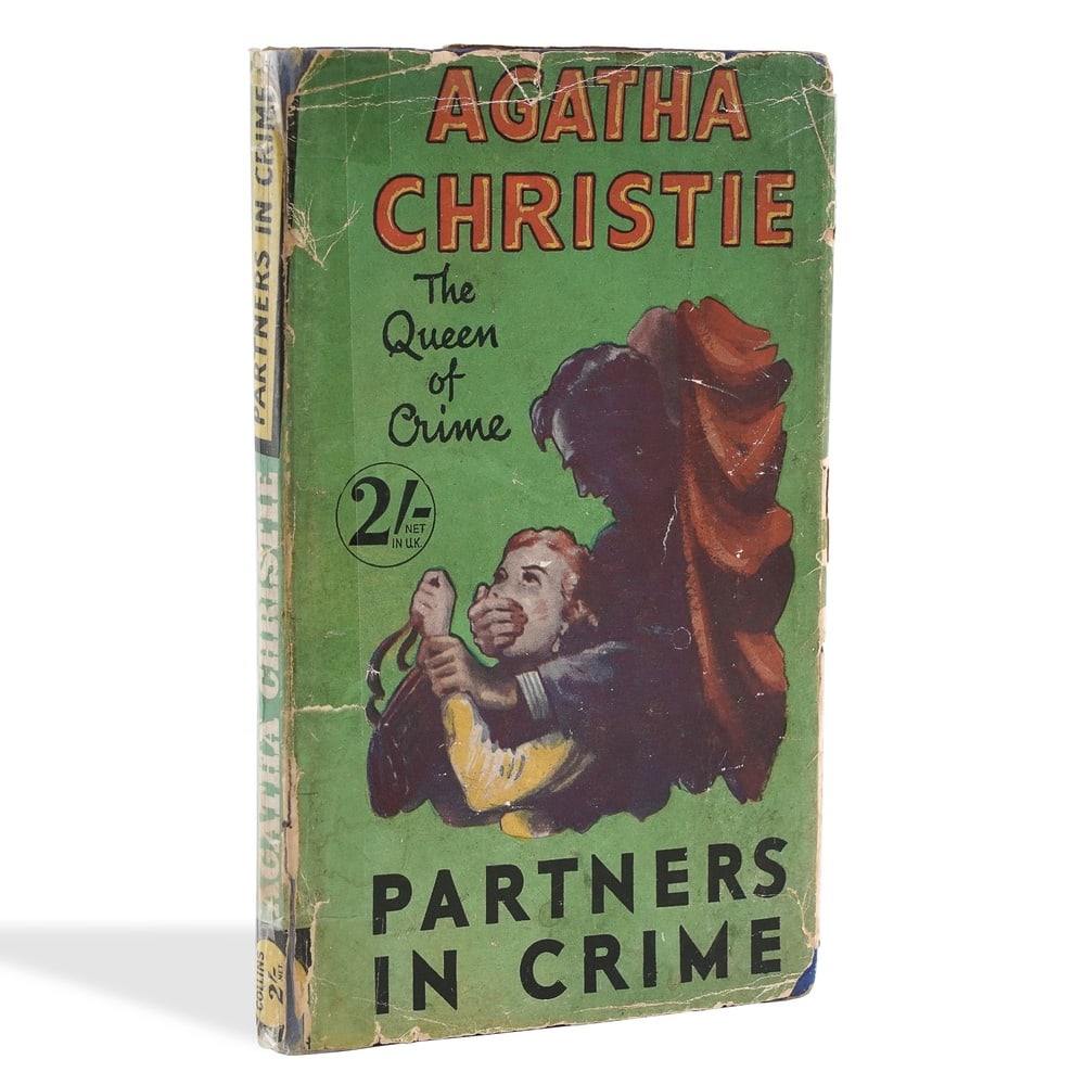 AGATHA CHRISTIE SIGNED "PARTNERS IN CRIME": 7 1/4 x 4 1/2 in (18.5 x 11.3 cm) Provenance and Authentication: This collectible has undergone a rigorous forensic evaluation. The signatures were carefully analyzed across multiple criteria, includi