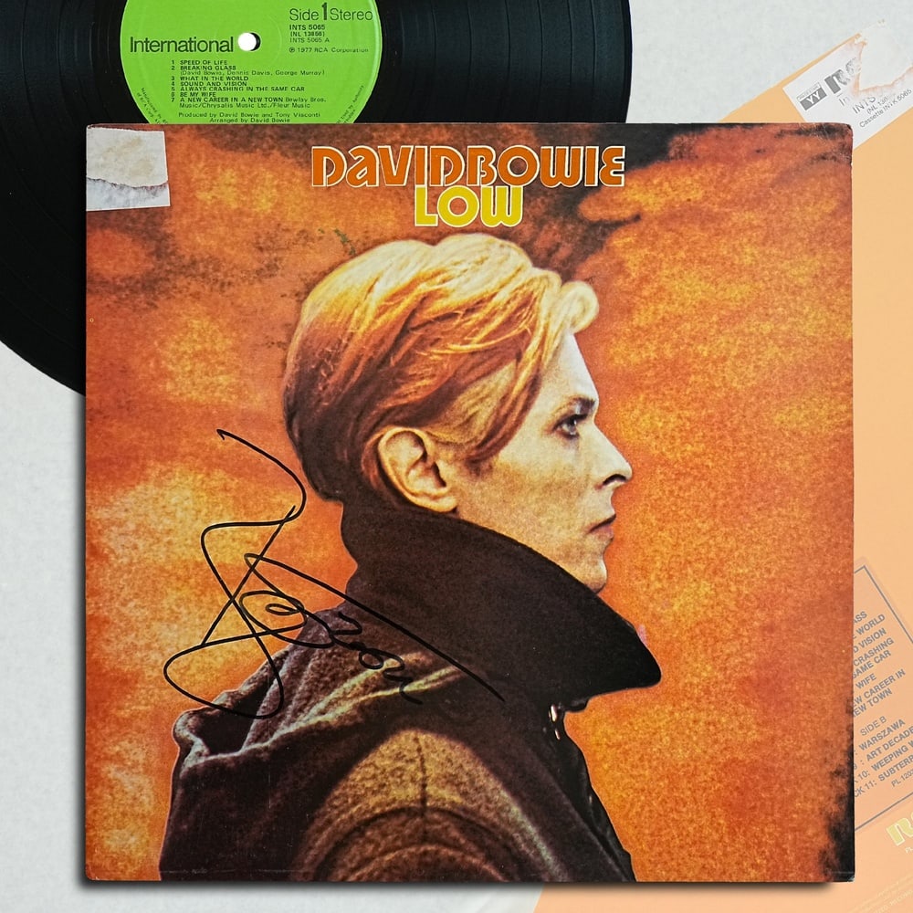 DAVID BOWIE SIGNED "LOW" UK LP: 12 1/4 x 12 1/4 Provenance and Authentication: This collectible has undergone a rigorous forensic evaluation. The signatures were carefully analyzed across multiple criteria, including ink deposition,