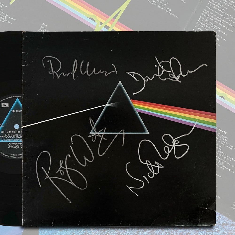 PINK FLOYD SIGNED LP "THE DARK SIDE OF THE MOON" (U.S. FIRST PRESSING): 12 1/4 x 12 1/4 Provenance and Authentication: This collectible has undergone a rigorous forensic evaluation. The signatures were carefully analyzed across multiple criteria, including ink deposition,