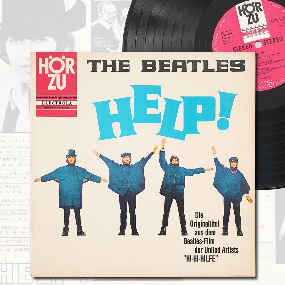 THE BEATLES FULLY SIGNED "HELP!" LP: 12 1/4 x 12 1/4 Provenance and Authentication: This collectible has undergone a rigorous forensic evaluation. The signatures were carefully analyzed across multiple criteria, including ink