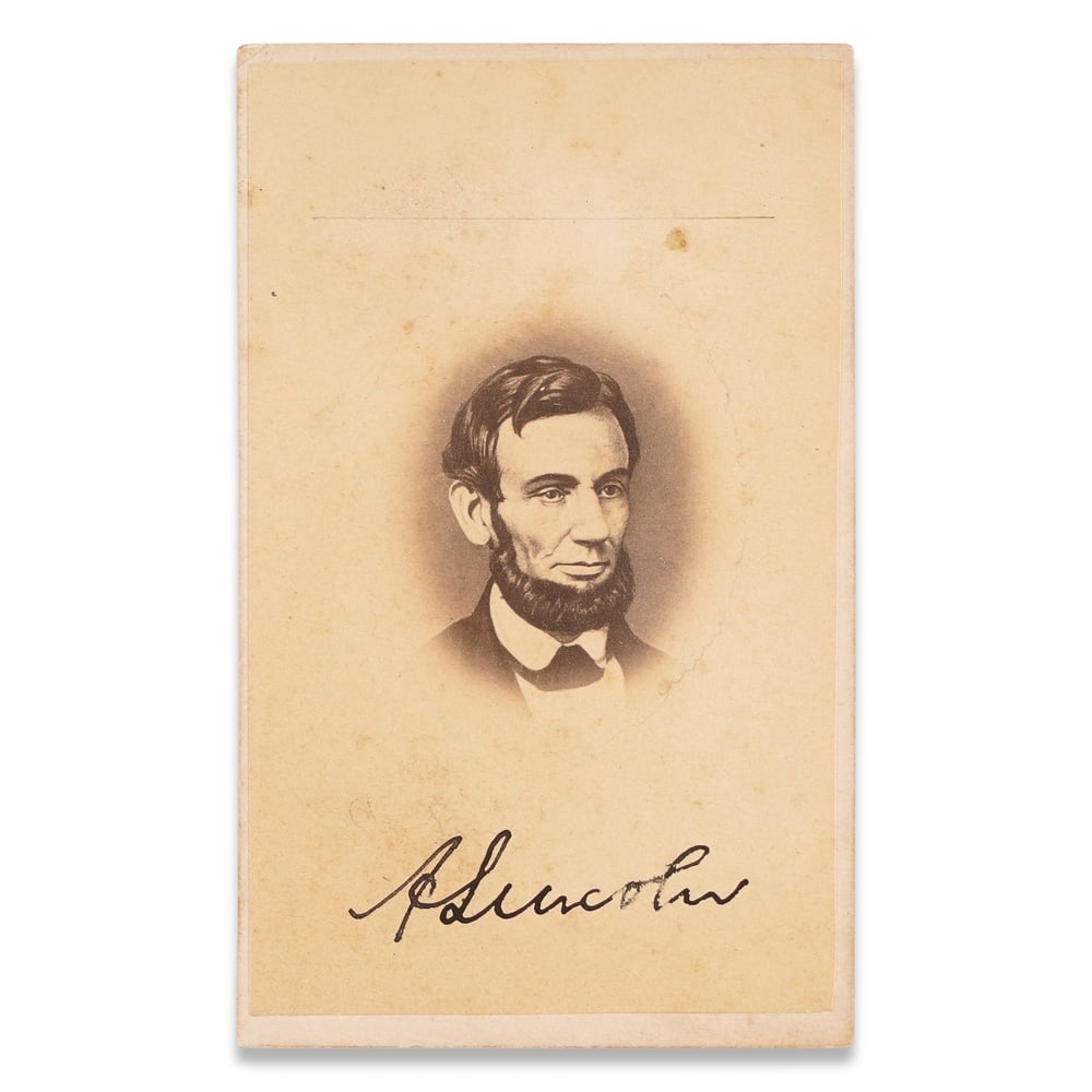 ABRAHAM LINCOLN SIGNED CDV PHOTOGRAPH: 4 x 2 1/2 in (10.2 x 6.2 cm) Provenance and Authentication: This collectible has undergone a rigorous forensic evaluation. The signatures were carefully analyzed across multiple criteria, including in