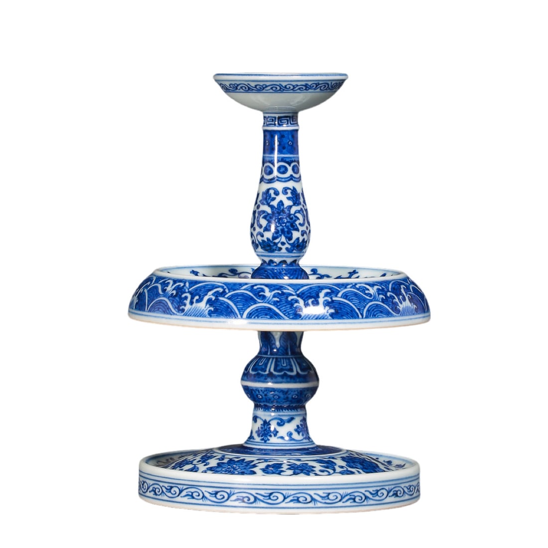 Qing Dynasty Qianlong Period Blue and White Water and Floral Scroll Candle Stand (1736–1795, 18th: Dimensions & Weight: Height 14.5 cm, maximum diameter 10.2 cm, approximately 5.7 inches high and 4.0 inches in maximum diameter (18th century?Material: PorcelainCondition & Provenance: The piece remai