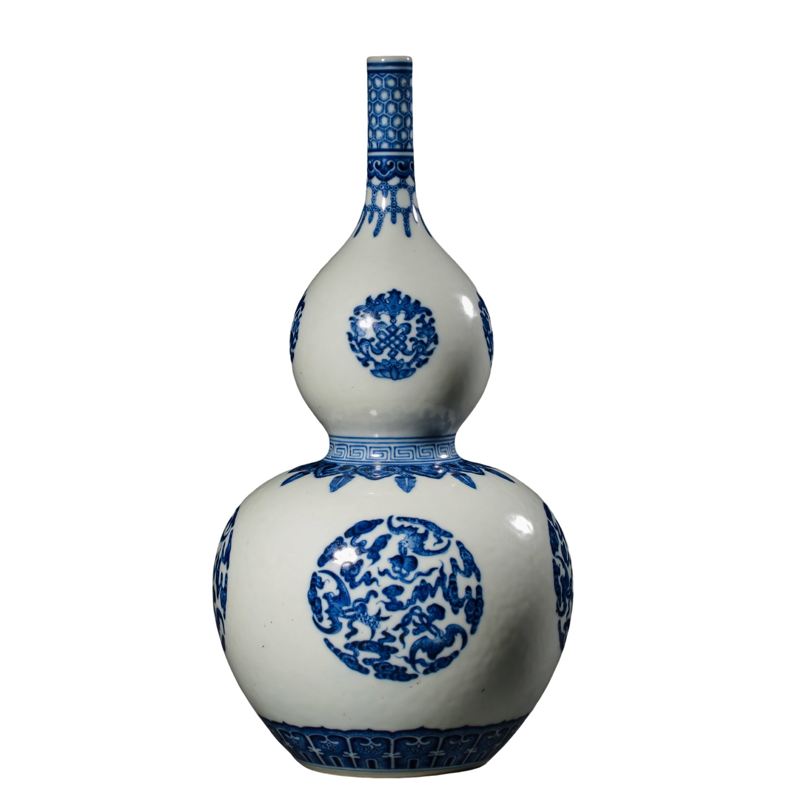 Qianlong Period Blue and White Gourd-Shaped Bottle with Round Floral Medallions (Qing Dynasty, 18th: Dimensions and Weight: Height 37 cm (14.57 in, 1.21 ft), Mouth Diameter 1.9 cm (0.75 in, 0.06 ft), weight not providedCondition and Provenance: Good overall condition with a smooth white glaze surface