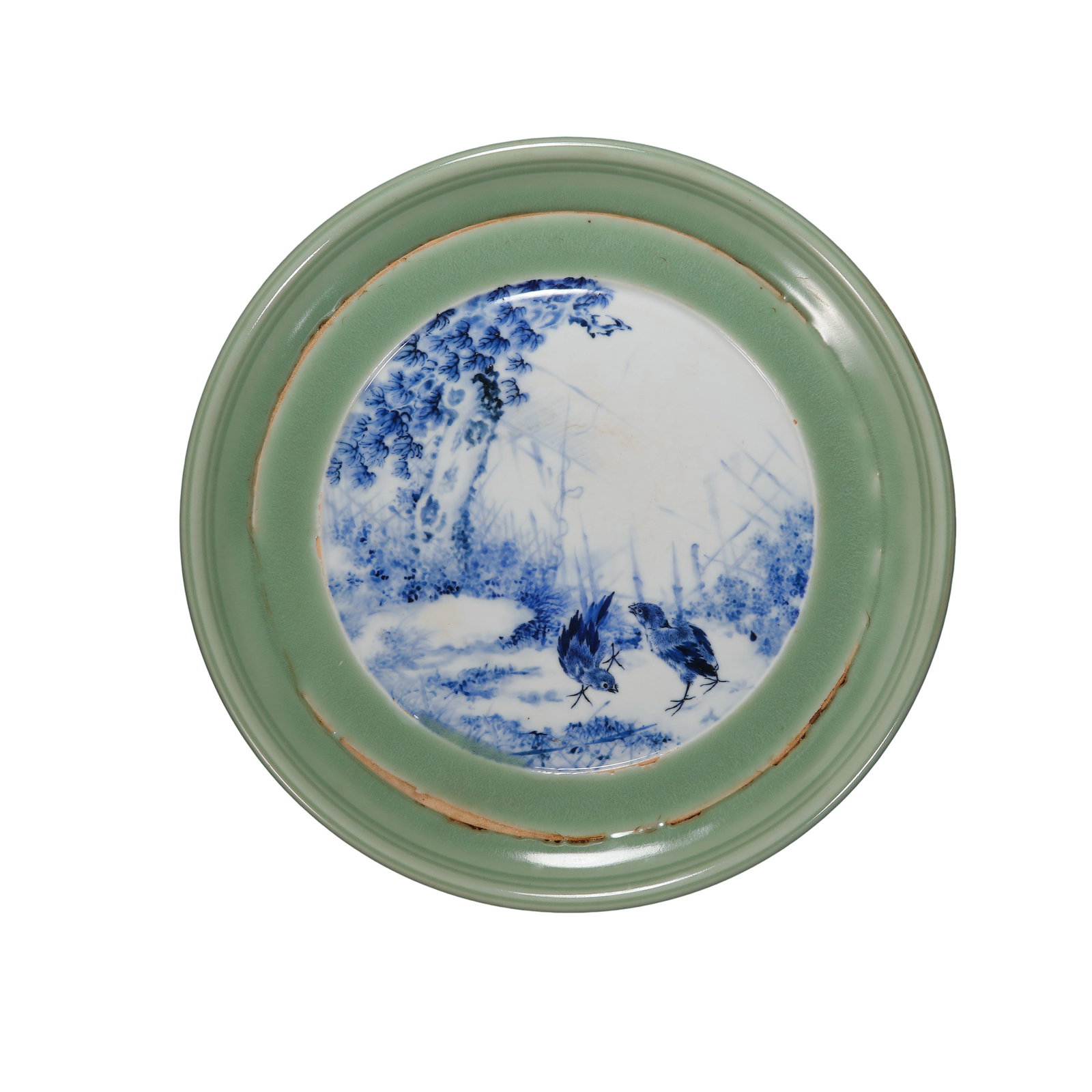 20th Century, Wang Bu, Large Celadon-Glazed and Blue-and-White Dish with Two Sparrows beneath a Pine: Dimensions: Diameter 27.8 cm (10.94 in / 0.91 ft); 20th CenturyCondition & Provenance: Overall in good condition, with the blue-and-white decoration remaining clear and the glaze retaining a soft lust