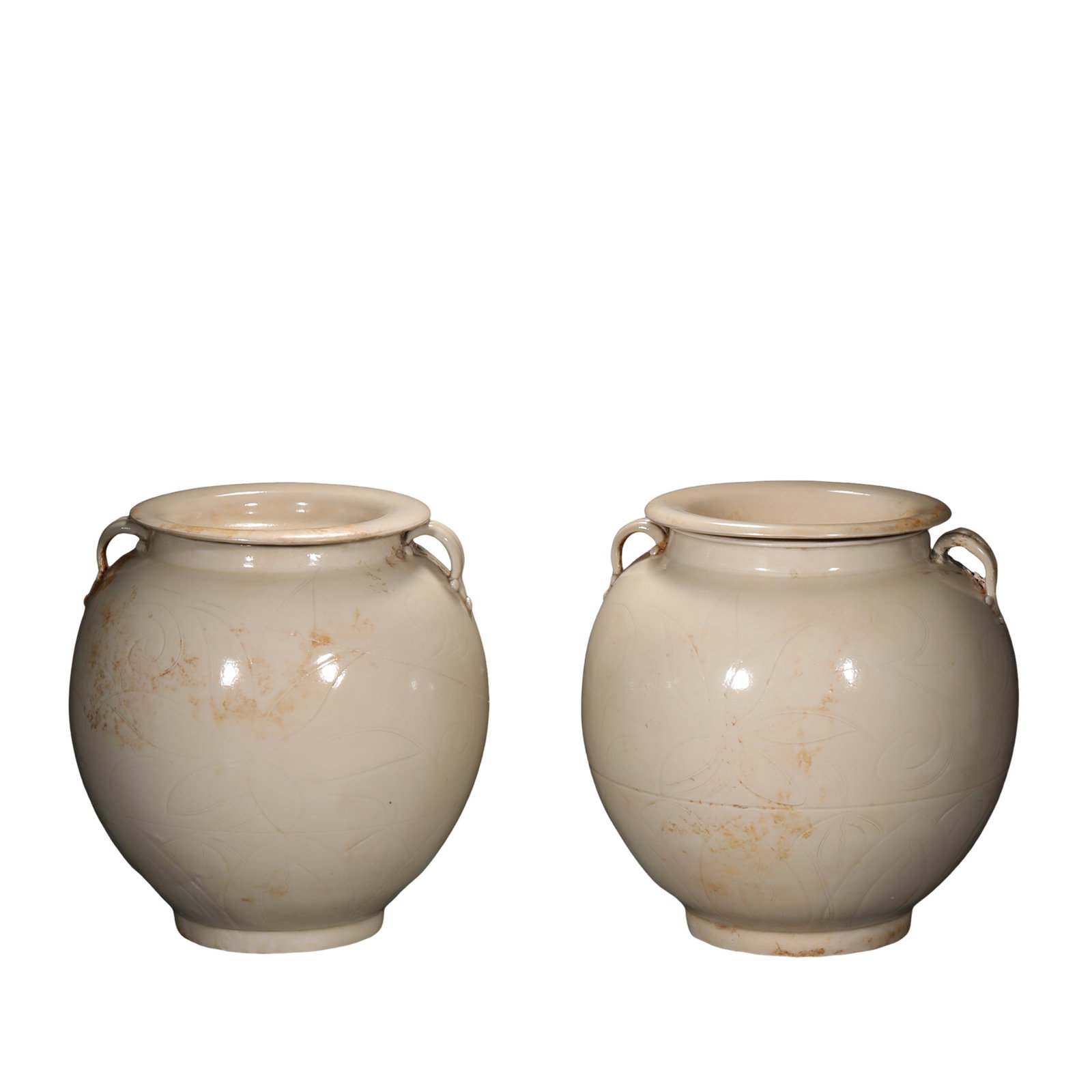 A Pair of Song Dynasty Ding Kiln White Glazed Carved Floral Double-Handle Covered Jars (11th–12th: Dimensions: Each jar: Height 19.3 cm (7.6 in, 0.63 ft); Width 18 cm (7.1 in, 0.59 ft); Song Dynasty, 11th–12th century Ding ware Condition and Provenance: Good overall condition with original matchi