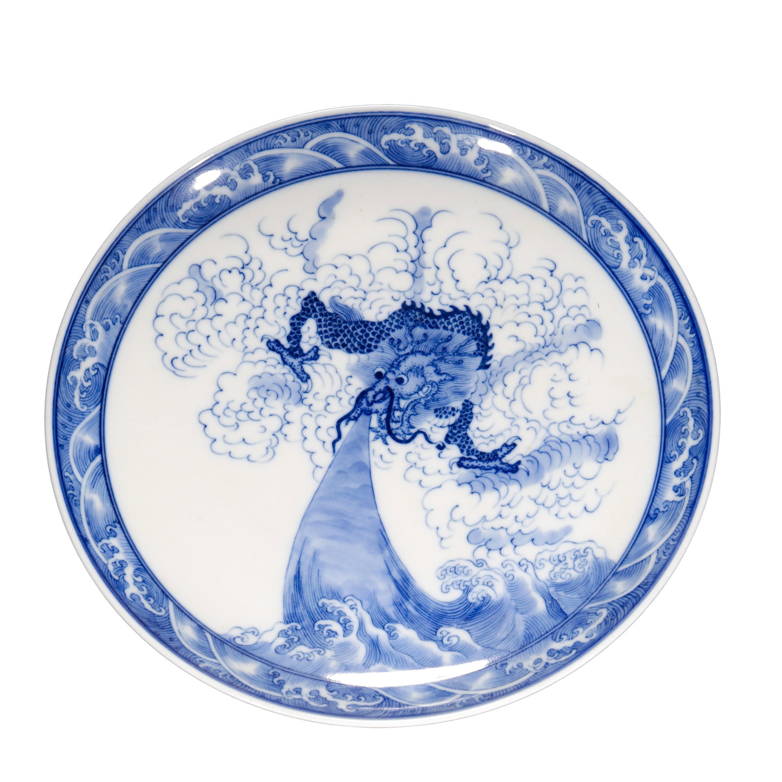 A Fine Qing Yongzheng Blue and White “Cloud Dragon, Sea Waves and Longevity Mountain?? Dish (Qing: Dimensions: H 3.2 cm (1.3 in), W 21 cm (8.3 in), 18th-century Qing porcelainCondition and Provenance: Good overall condition with well-preserved glaze and clear blue-and-white decoration. Provenance: 