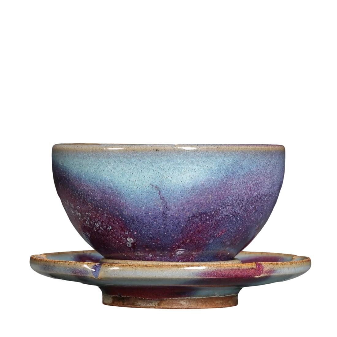 Song Dynasty Jun Kiln Sky-Blue Glazed Tea Bowl and Flower-Shaped Stand Set with Rose Purple Splashes: Dimensions: Tea bowl: Diameter 10.6 cm (4.2 in, 0.35 ft), Height 6.5 cm (2.6 in, 0.21 ft); Tea stand: Diameter approximately 15 cm (5.9 in, 0.49 ft); Song Dynasty (12th Century)Condition and Provenanc