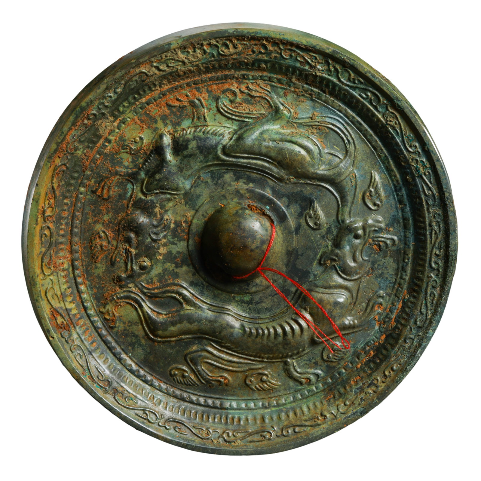 Han Dynasty Bronze Circular Mirror with Dragon, Tiger and Auspicious Beast Decoration (206 BCE–220: Dimensions & Weight: Diameter 12.3 cm (4.84 in, 0.40 ft); Weight 472 g (1.04 lb)Condition & Provenance: Overall well preserved with a solid bronze body. The reverse displays natural layers of green pa