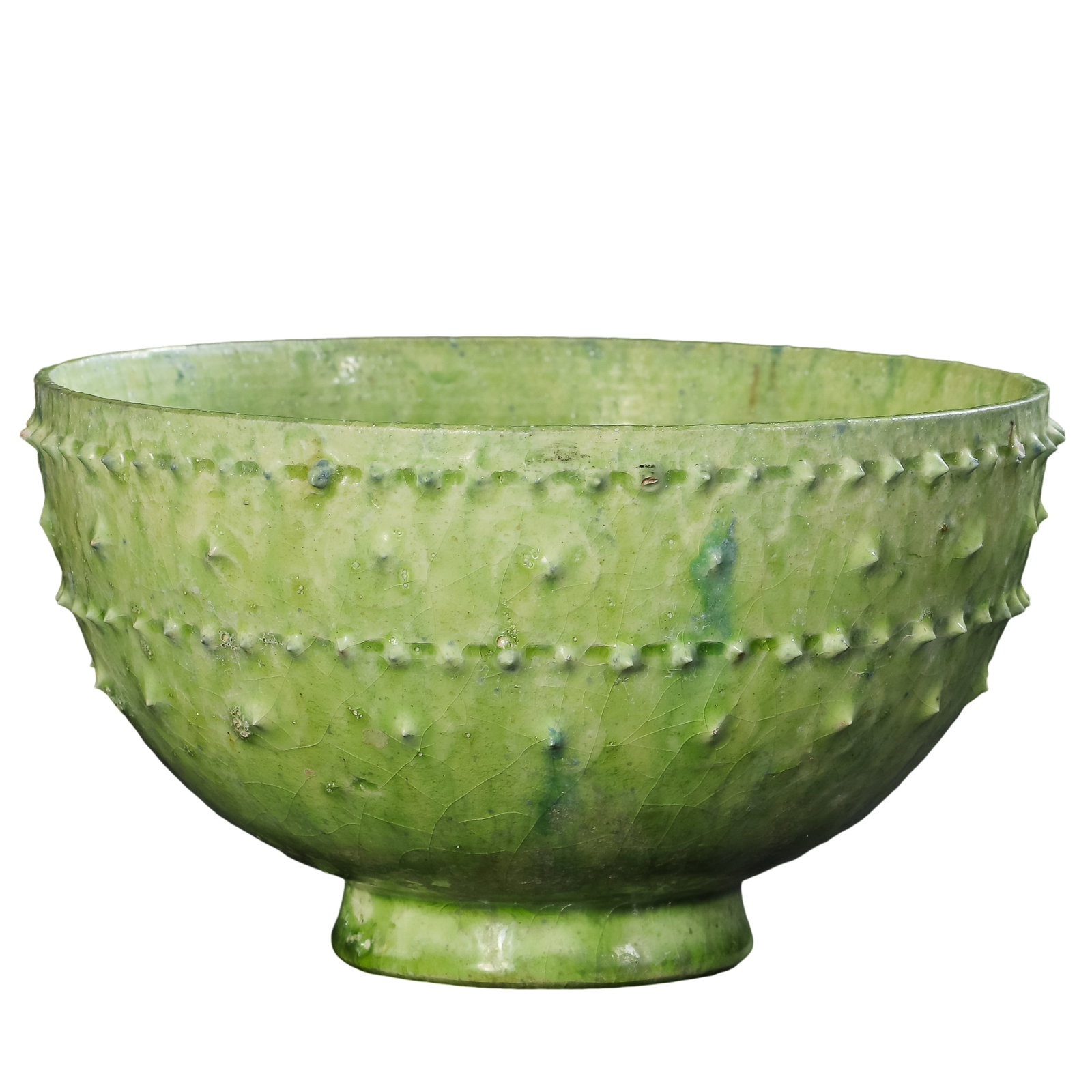 Northern Dynasties Green-Glazed Tall Foot Bowl with Raised Thorn-Pattern Decoration (6th Century): Dimensions: Diameter 11.5 cm, Height 7 cm (6th Century, approximately 4.5 in diameter × 2.8 in high, approximately 0.38 ft diameter × 0.23 ft high)?Condition & Provenance: Well preserved overall, wi