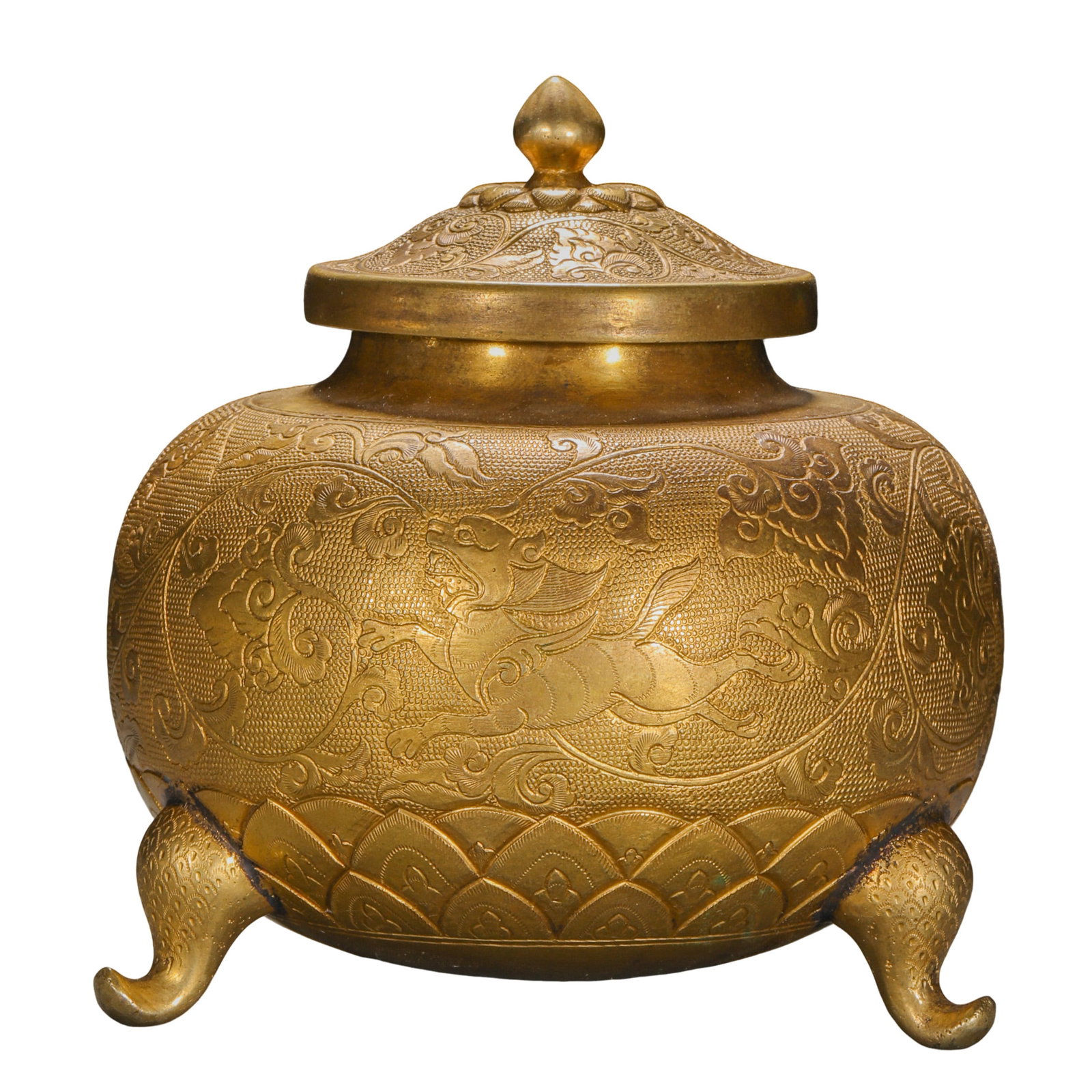 Gilt-Bronze Tripod Covered Jar with Engraved Scrollwork and Auspicious Winged Beast Decoration (Qing: Dimensions: H. approx. 9 cm (3.5 in / 0.30 ft); W. approx. 8.5 cm (3.3 in / 0.28 ft); Weight: approx. 299 g (10.55 oz); Qing Dynasty (18th–19th Century)?Condition & Provenance: The vessel is preserv