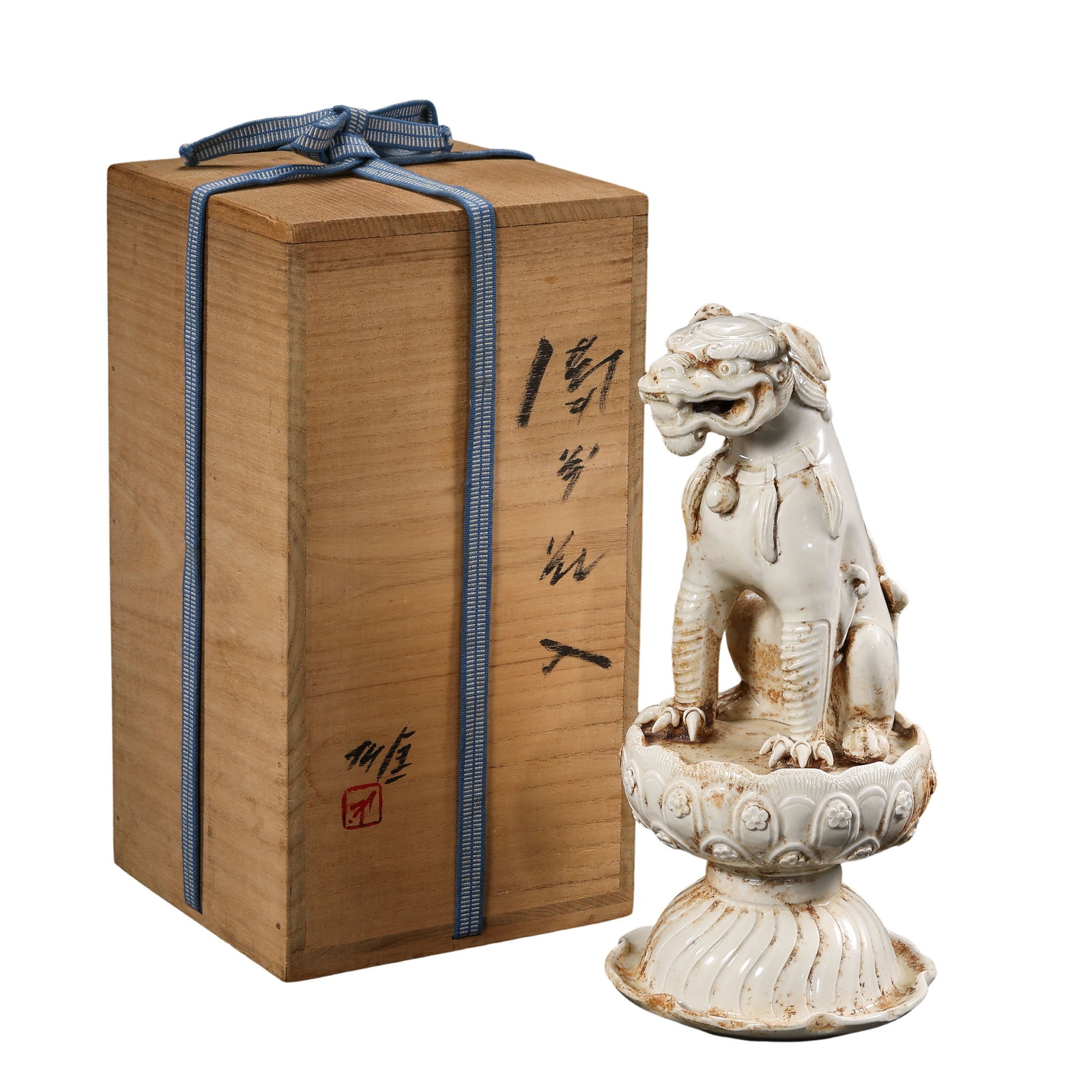 Early Ming Dynasty (15th Century) White-Glazed Buddhist Guardian Lion Sculpture on Lotus Base with: Dimensions & Weight: H 27.5 cm / 10.8 in; W 13.5 cm / 5.3 in; 15th century (Ming Dynasty); weight not provided?Condition & Provenance: The sculpture is in good overall condition, with well-preserved f